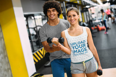Tank Top Mockup of a Woman Getting Trained at a Gym 39627-r-el2