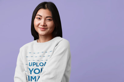 Sweatshirt Mockup of a Smiling Woman Posing in a Studio