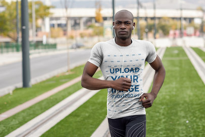 Mockup of a Man Jogging with a Round Neck T-Shirt