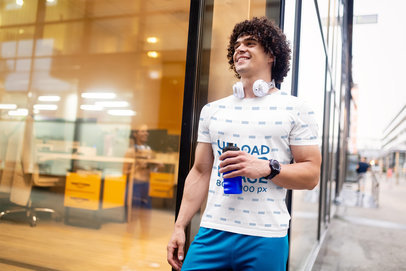 Activewear Mockup of a Man with Curly Hair Wearing a Sublimated Tee 