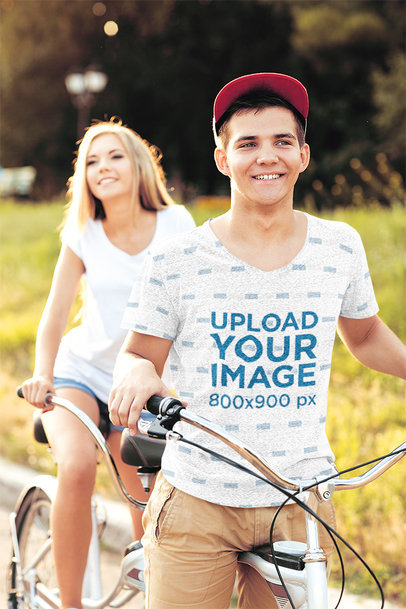 Sublimated T-Shirt Mockup of a Man Riding a Bicycle with his Girlfriend 36133-r-el2