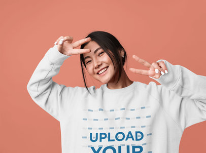 Crewneck Sweatshirt Mockup of a Happy Woman in a Studio