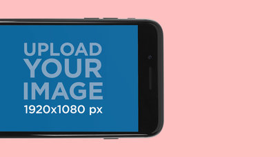 Mockup of a Space Grey iPhone 7 in Landscape Position with a Customizable Screenshot