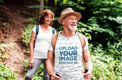 Mockup of a Senior Man with a Sublimated T-Shirt Hiking with a Friend