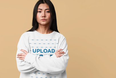 Sweatshirt Mockup of a Serious Woman with Crossed Arms