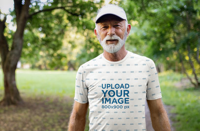 Mockup of a Senior Man Wearing an Activewear Sublimated T-Shirt 
