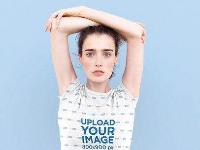 Sublimated T-Shirt Mockup of a Woman Posing With Her Arms Over Her Head 