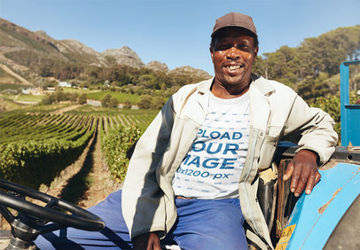 T-Shirt Mockup of a Farmer Sitting on His Tractor 37453-r-el2