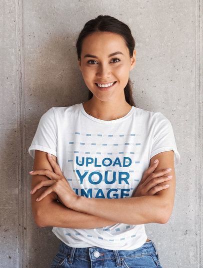 T-Shirt Mockup of a Smiling Young Woman with Crossed Arms
