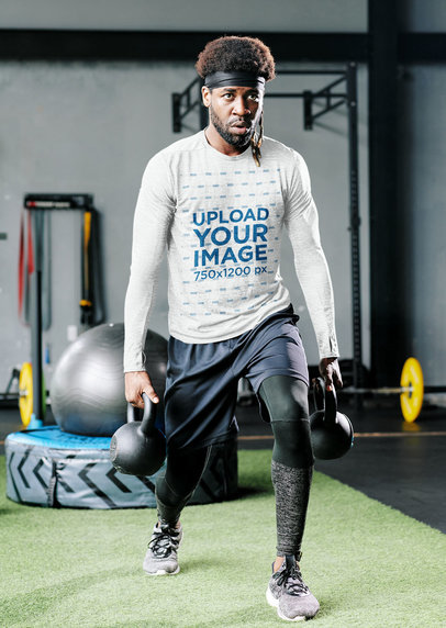 Mockup of a Man Wearing a Heather Long Sleeve Tee at the Gym
