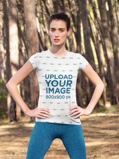 Sublimated T-Shirt Mockup Featuring a Woman With Her Hands on Her Hips 