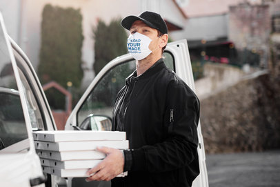Mockup of a Delivery Man Wearing a Face Mask 