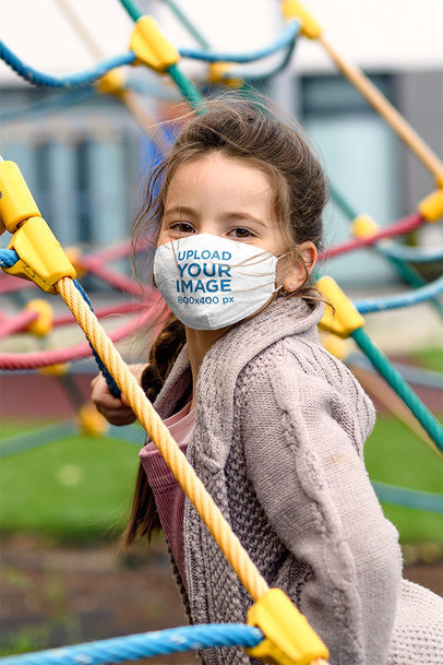 Face Mask Mockup Featuring a Happy Girl at a Playground 39867-r-el2