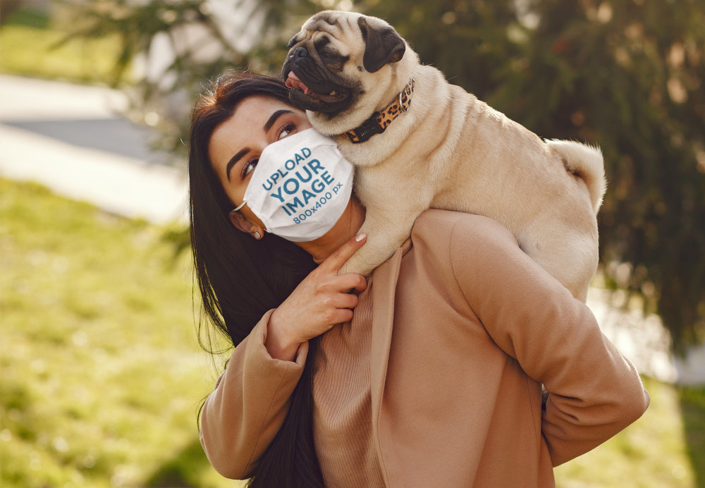 Face Mask Mockup Featuring a Woman With a Pug