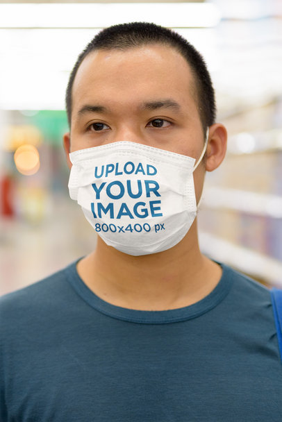 Mockup of a Man Wearing a Face Mask at the Super Market 
