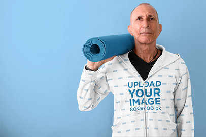 Mockup of a Senior Man Wearing a Sublimated Full-Zip Hoodie 