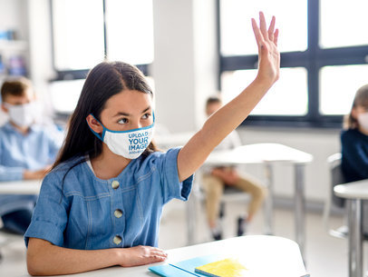 Face Mask Mockup Featuring a Girl Raising Her Hand During Class 