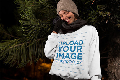 Crewneck Sweatshirt Mockup of a Happy Woman Posing by a Pine Tree 13243