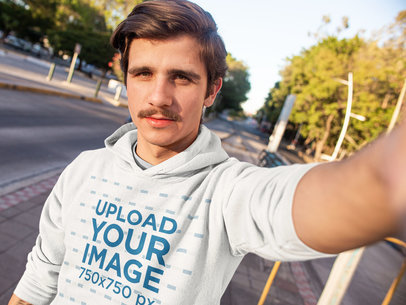 Selfie Mockup Featuring a Man with a Moustache Wearing a Hoodie 13610
