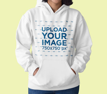 Closeup View Mockup Featuring a Woman with a Pullover Hoodie at a Studio