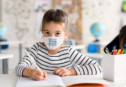 Mockup of a Little Girl Wearing a Sublimated Face Mask at School 