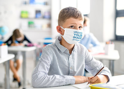 Face Mask Mockup Featuring a Boy Writing at School 