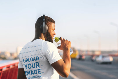T-Shirt Mockup of the Back View of a Runner Drinking Some Water 38823-r-el2