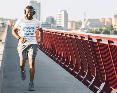 Activewear Tee Mockup of a Man Running on the Street 