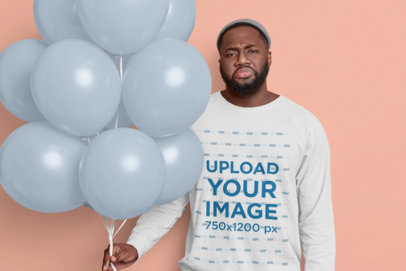 Long Sleeve Tee Mockup of a Man with a Sad Face Holding a Bunch of Balloons