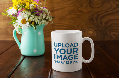Mockup of an 11 oz Mug Placed Next to a Flower Vase