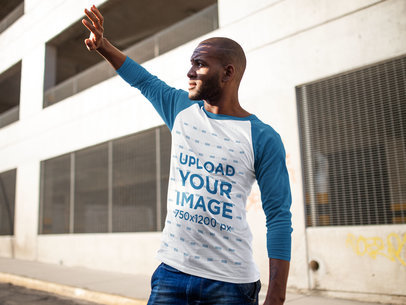 Raglan Long Sleeve Tee Mockup of a Man Covering From the Sun 12544