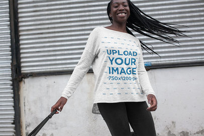 Mockup of a Happy Woman Wearing a Heather Bella Canvas Long Sleeve Tee