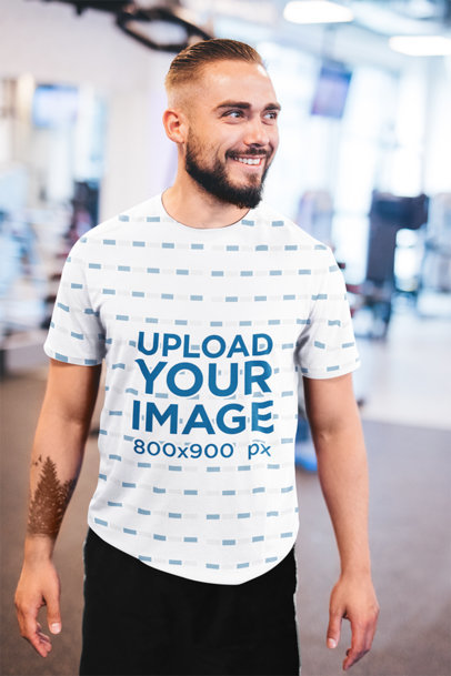 Sublimated T-Shirt Mockup of a Happy Bearded Man at the Gym