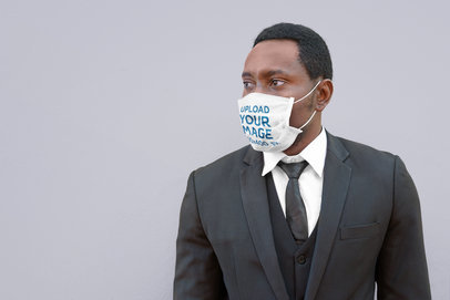 Mockup of an Elegant Man Wearing a Face Mask 