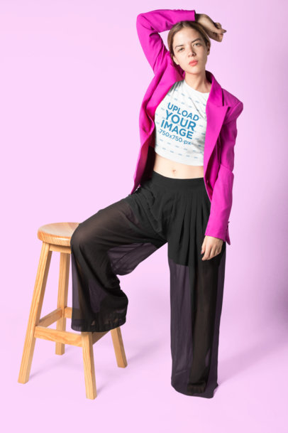 Crop Top Mockup Featuring a Fashionable Woman in a Studio