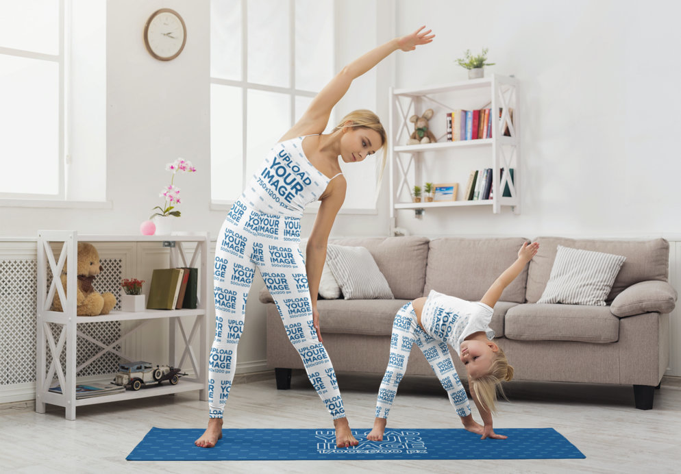 Tank Top and T-Shirt Mockup of a Mom and Her Daughter Sharing a Yoga Mat with Leggings