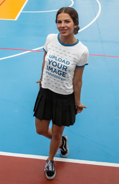 Mockup of a Teenage Girl Wearing a Ringer Tee at a Court 