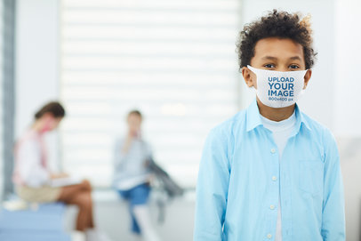Face Mask Mockup Featuring a Curly-Haired Boy