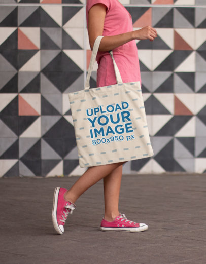 Tote Bag Mockup Carried by a Woman Walking