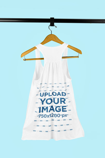 Mockup of a Slouchy Tank Top on a Wooden Hanger