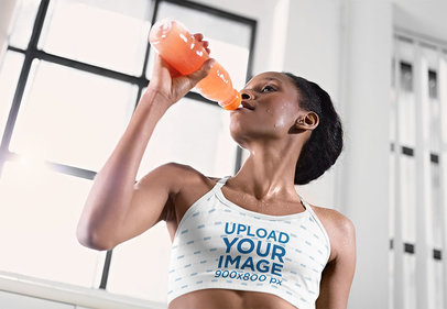 Sports Bra Mockup Featuring a Woman Rehydrating Herself 35603-r-el2