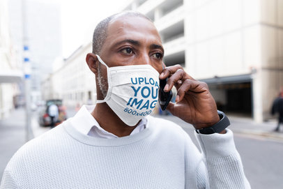 Face Mask Mockup of a Man Talking on the Phone on the Street