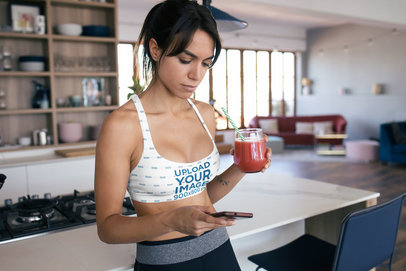 Sports Bra Mockup of a Woman Drinking Juice at Home 34853-r-el2