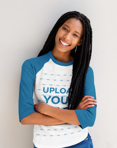 Mockup of a Smiling Woman with Locks Wearing a Raglan Tee