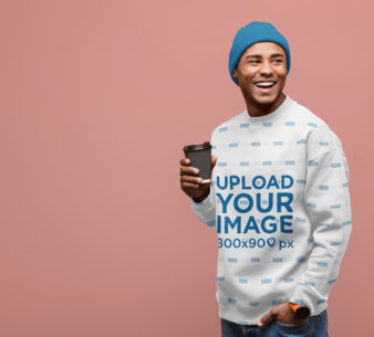 Sublimated Sweatshirt Mockup of a Man Having a Coffee at a Studio