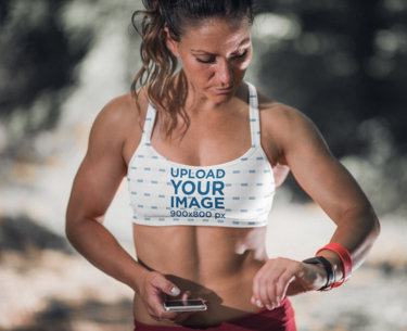 Sports Bra Mockup of an Athletic Woman About to Train