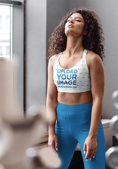 Mockup of a Woman With a Sublimated Sports Bra Training at the Gym 