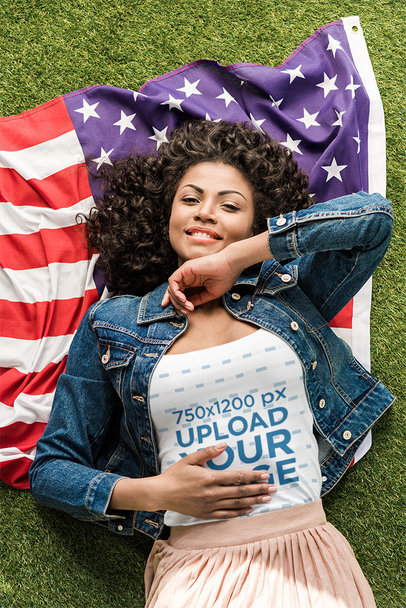 T-Shirt Mockup of a Smiling Woman Lying over a Flag 39951-r-el2