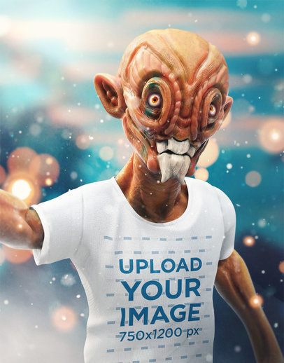 Illustrated Mockup of an Orange Alien Taking a Selfie with a T-Shirt