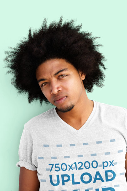 Mockup of a Serious Man Wearing a Heathered V-Neck Tee 